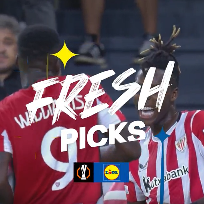Nogometaši v rdeče-belih dresih z napisom „FRESH PICKS“ in logotipom Lidl.